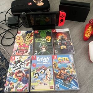 Nintendo Switch with accessories and games